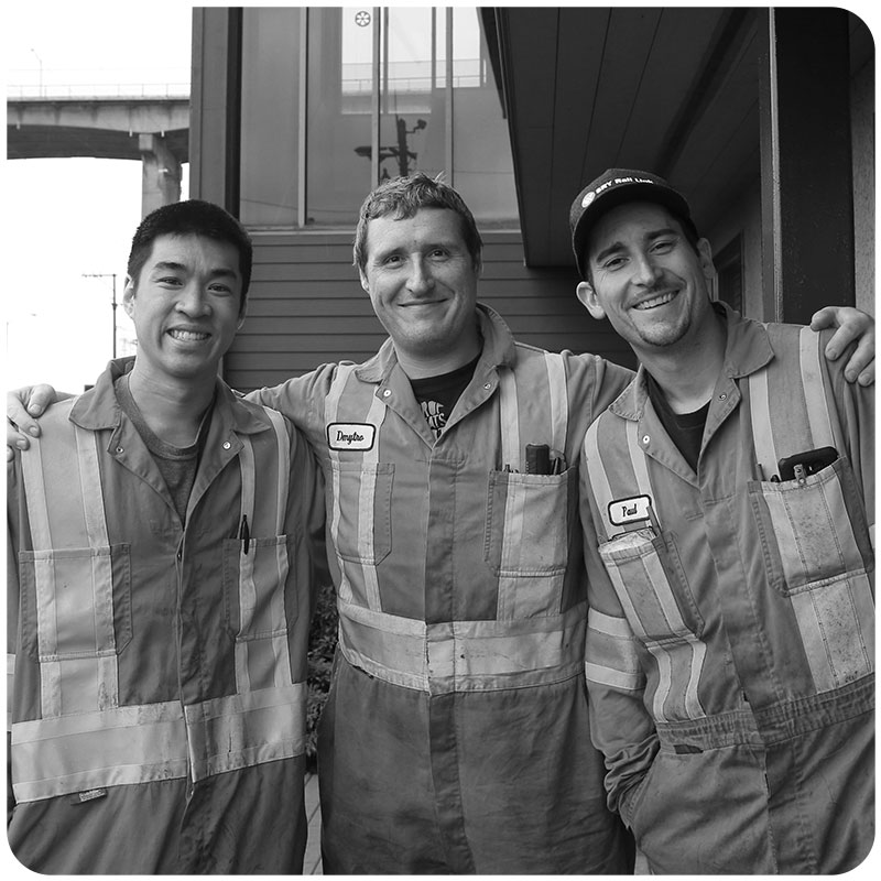 Three workers standing together